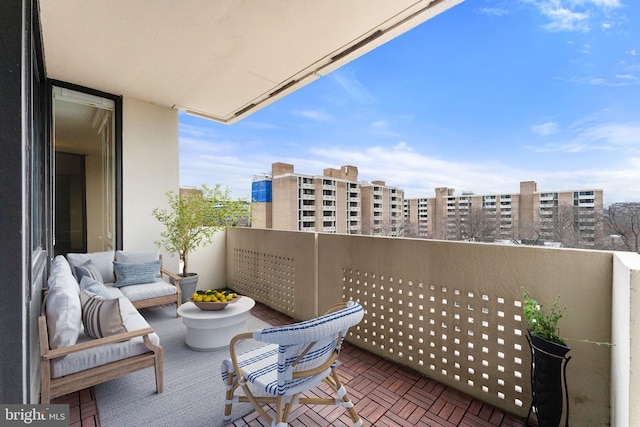 balcony with an outdoor hangout area