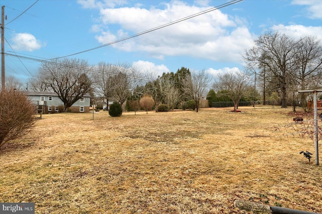 view of yard with fence