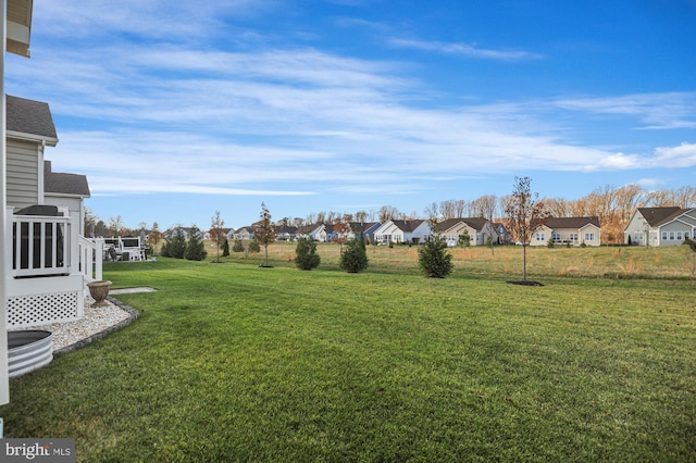 view of yard with a residential view