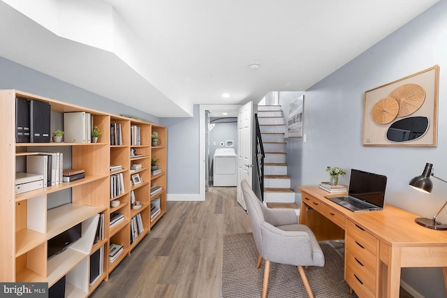 office space featuring baseboards, wood finished floors, recessed lighting, and washer / clothes dryer