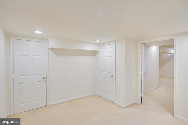 finished below grade area featuring baseboards, carpet flooring, and recessed lighting