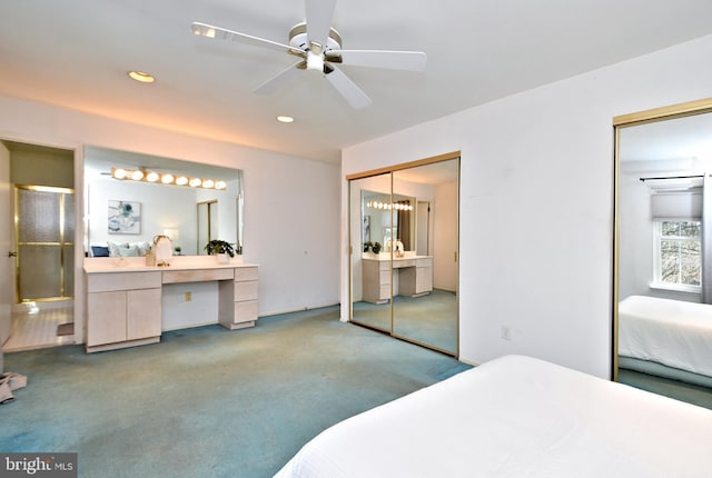 bedroom with carpet, multiple closets, recessed lighting, a ceiling fan, and ensuite bath