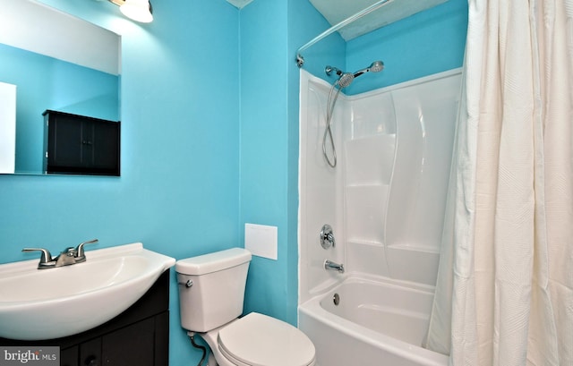 full bath featuring toilet, shower / bath combination with curtain, and vanity