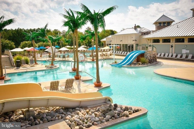 pool with a water slide