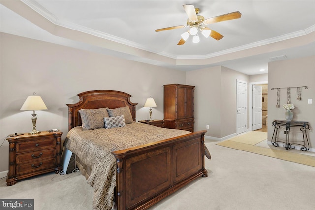 bedroom with crown molding, baseboards, visible vents, and light carpet