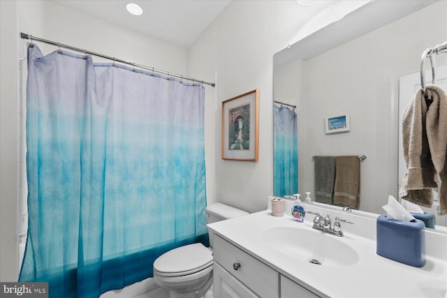 full bathroom featuring toilet and vanity