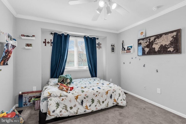 carpeted bedroom featuring a ceiling fan, baseboards, and ornamental molding