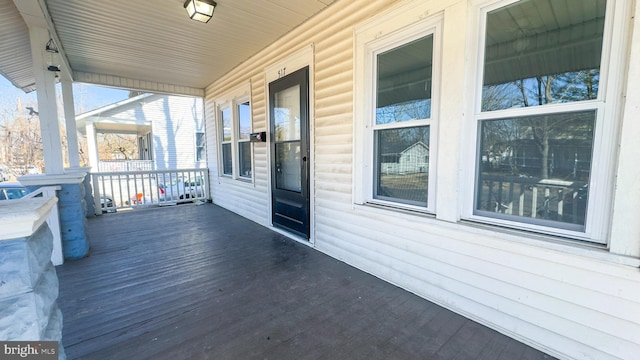 wooden deck with a porch