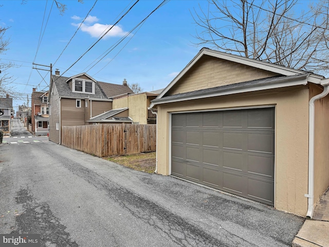 detached garage with fence