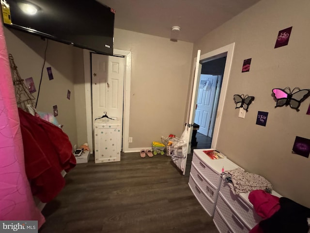 bedroom with wood finished floors