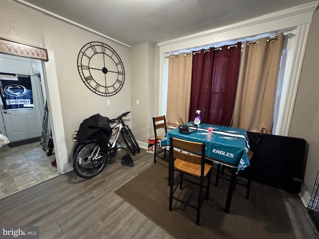 dining area with wood finished floors