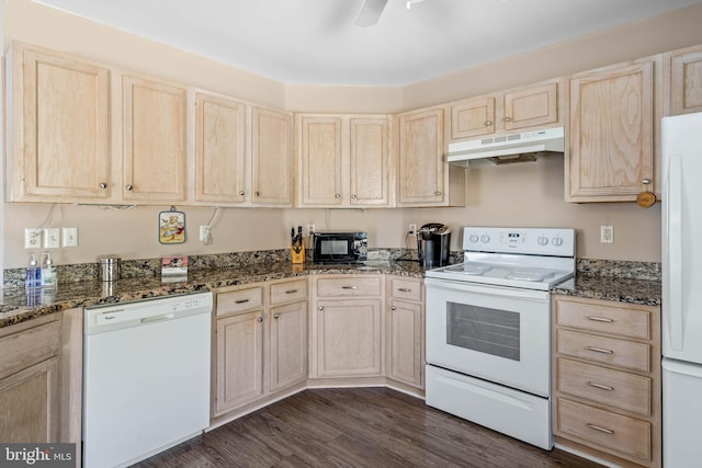 kitchen with under cabinet range hood, white appliances, and light brown cabinetry