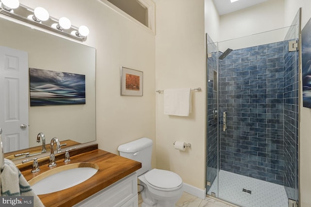 bathroom with marble finish floor, a shower stall, toilet, and vanity