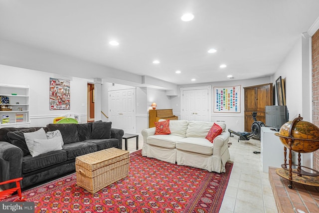 living room featuring light tile patterned floors and recessed lighting