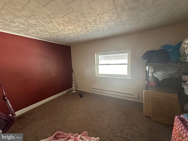 interior space featuring carpet, baseboards, crown molding, and baseboard heating