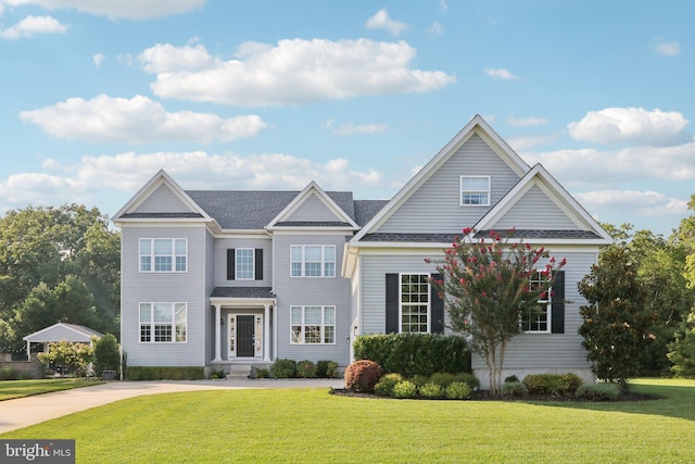 view of front of property with a front lawn