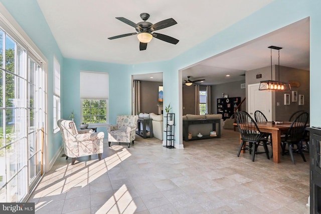 interior space with a ceiling fan