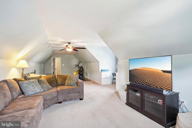 living room with lofted ceiling and light colored carpet