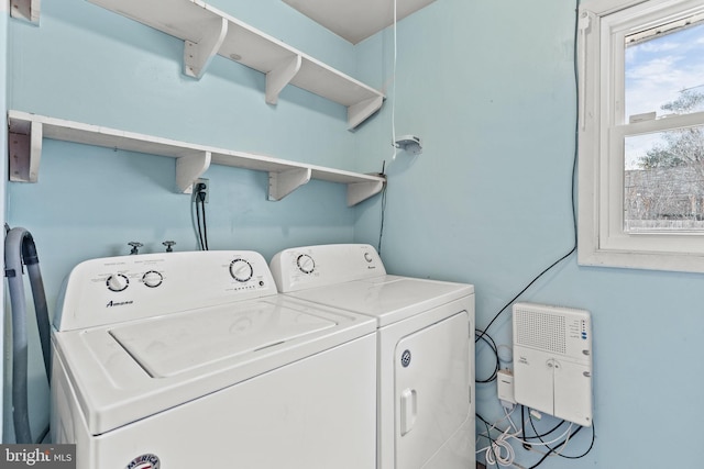 laundry area featuring laundry area and washing machine and clothes dryer