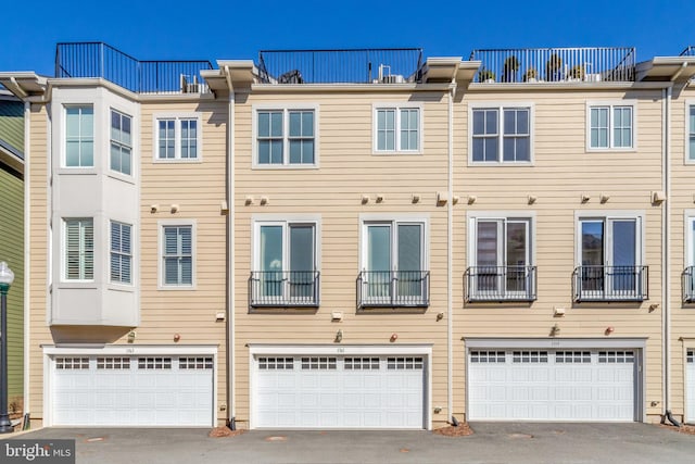 exterior space featuring a garage and driveway