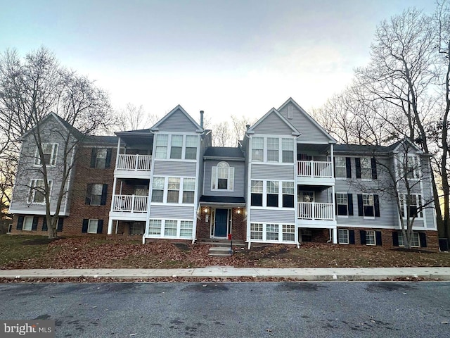 view of front of home with brick siding