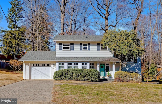 9306 Glenbrook Rd, Fairfax, VA 22031 - traditional home featuring a garage, driveway, a front yard, and roof with shingles