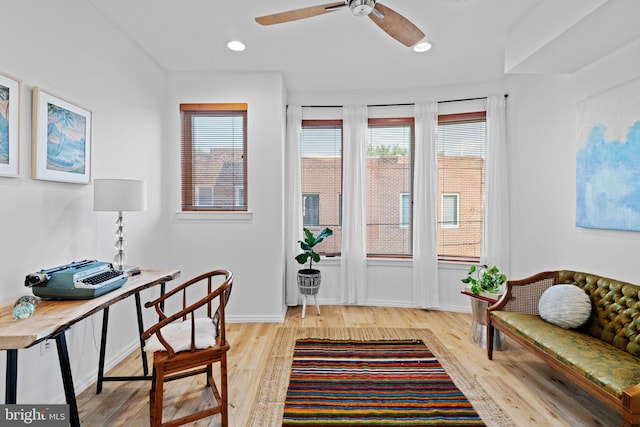 office area featuring light wood-type flooring, ceiling fan, baseboards, and recessed lighting