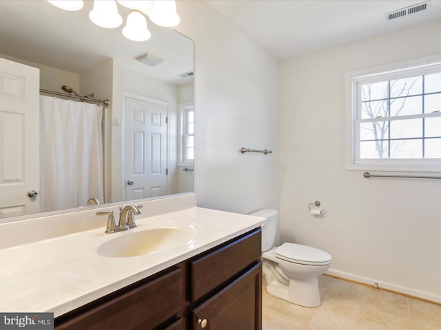 full bathroom with tile patterned flooring, toilet, vanity, and visible vents