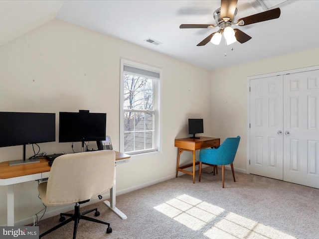 office area with visible vents, ceiling fan, carpet, and vaulted ceiling