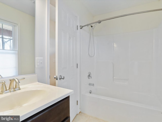 full bath with shower / bathing tub combination, vanity, and tile patterned flooring