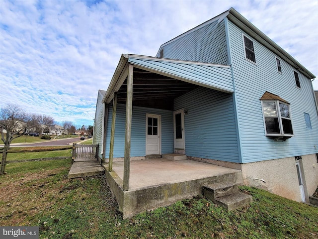 back of house featuring a patio area