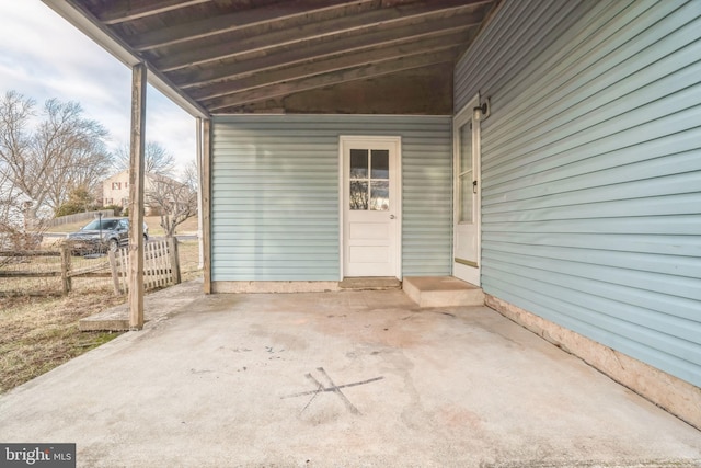 view of patio featuring fence