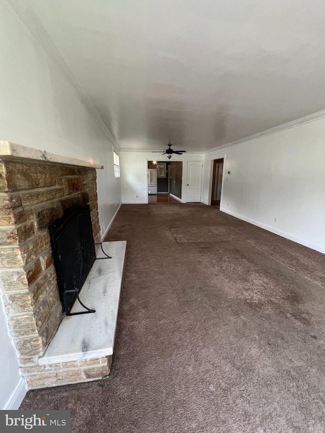 8211 Beach Dr, Baltimore, MD 21222 - unfurnished living room with ornamental molding, carpet flooring, a stone fireplace, ceiling fan, and baseboards