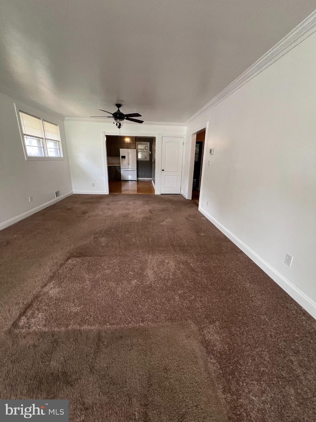 8211 Beach Dr, Baltimore, MD 21222 - unfurnished living room with dark carpet, baseboards, ceiling fan, and ornamental molding