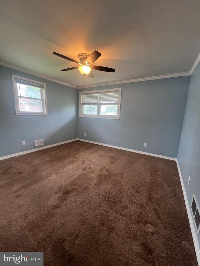 8211 Beach Dr, Baltimore, MD 21222 - unfurnished room with crown molding, carpet, plenty of natural light, ceiling fan, and baseboards