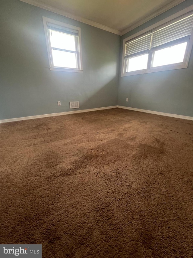8211 Beach Dr, Baltimore, MD 21222 - empty room featuring crown molding, baseboards, and carpet floors