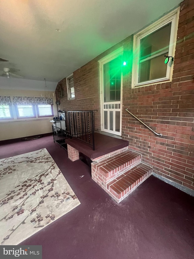 8211 Beach Dr, Baltimore, MD 21222 - interior space with brick wall
