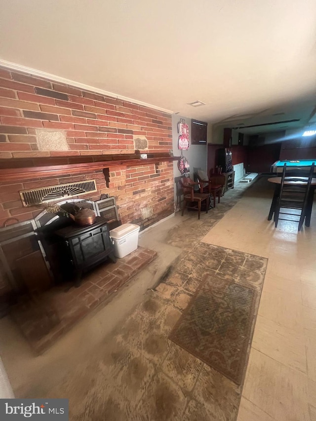 8211 Beach Dr, Baltimore, MD 21222 - living room with a wood stove