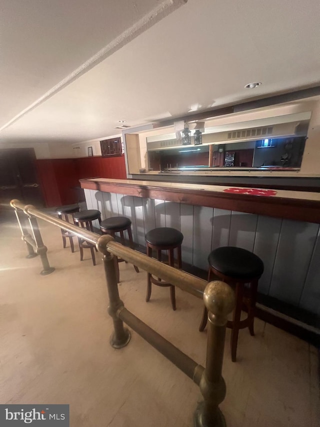 8211 Beach Dr, Baltimore, MD 21222 - indoor dry bar featuring carpet flooring