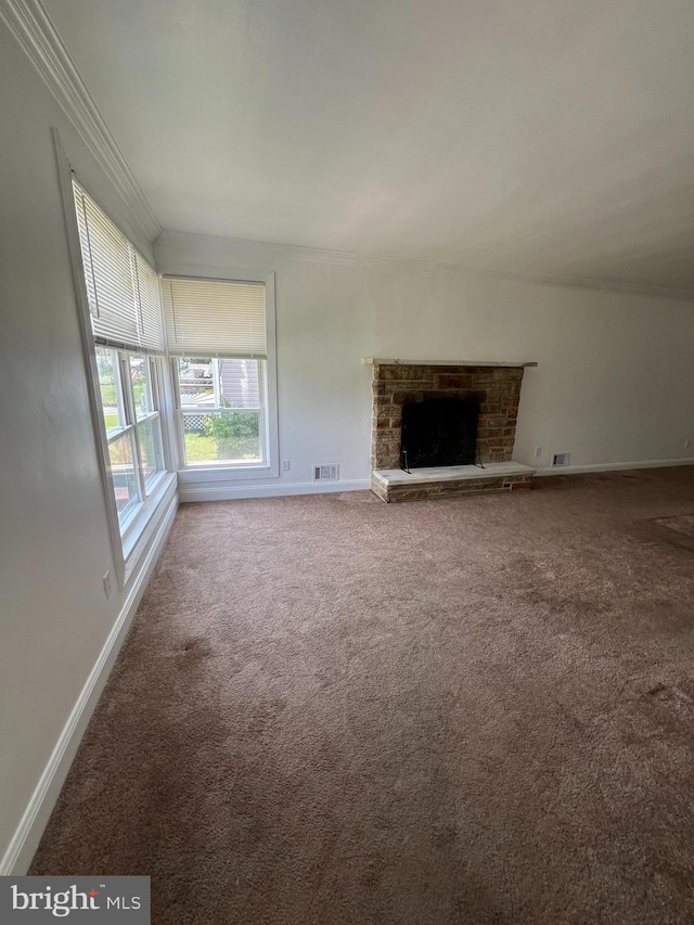 8211 Beach Dr, Baltimore, MD 21222 - unfurnished living room with carpet flooring, crown molding, baseboards, and a brick fireplace