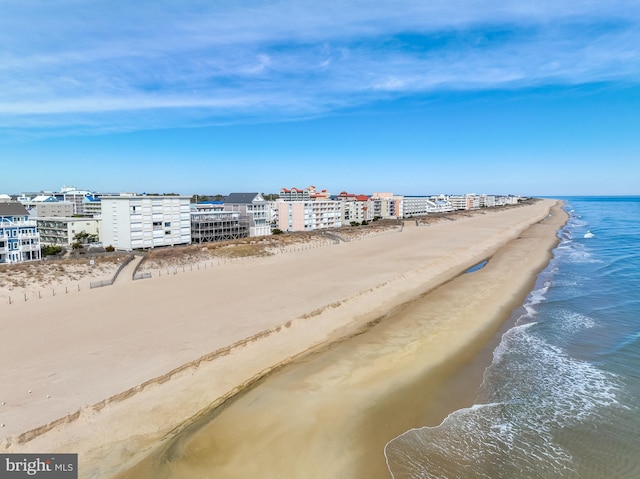 view of water feature with a view of the beach and a view of city