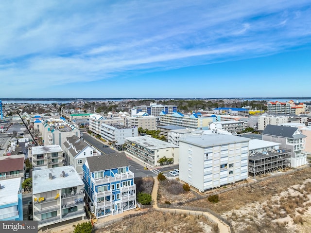 aerial view featuring a water view and a view of city