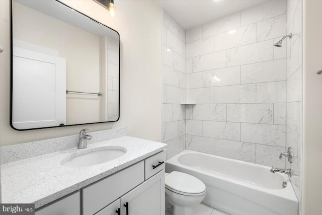 bathroom with toilet, shower / washtub combination, and vanity