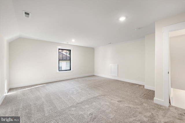 carpeted empty room with recessed lighting, visible vents, and baseboards