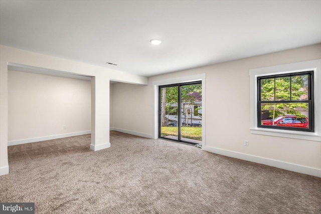 interior space with visible vents and baseboards