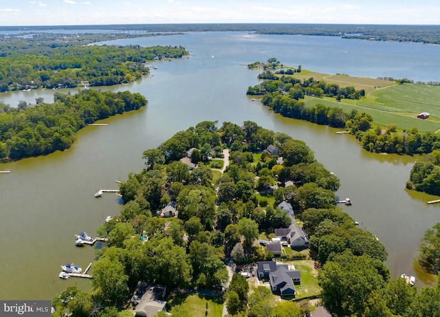 drone / aerial view with a water view