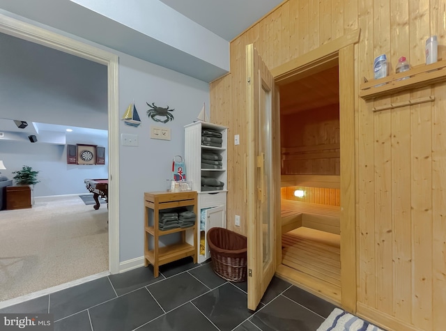 view of sauna / steam room featuring tile patterned floors and carpet