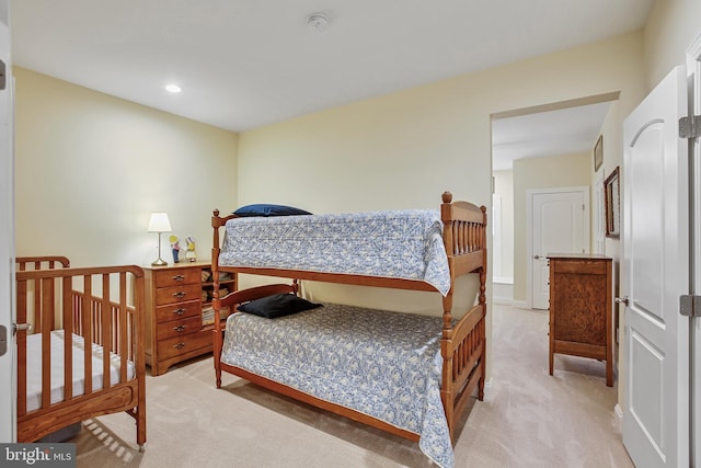 bedroom featuring recessed lighting and light colored carpet