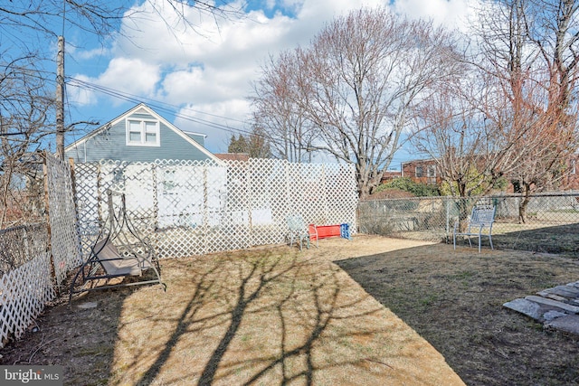 view of yard featuring a fenced backyard