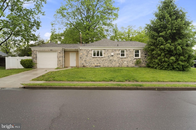 single story home with driveway, an attached garage, stone siding, and a shingled roof